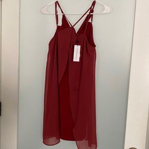 It’s a light burgundy Mimi dress with open front and thin straps